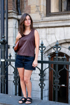 Brown top with red stitching