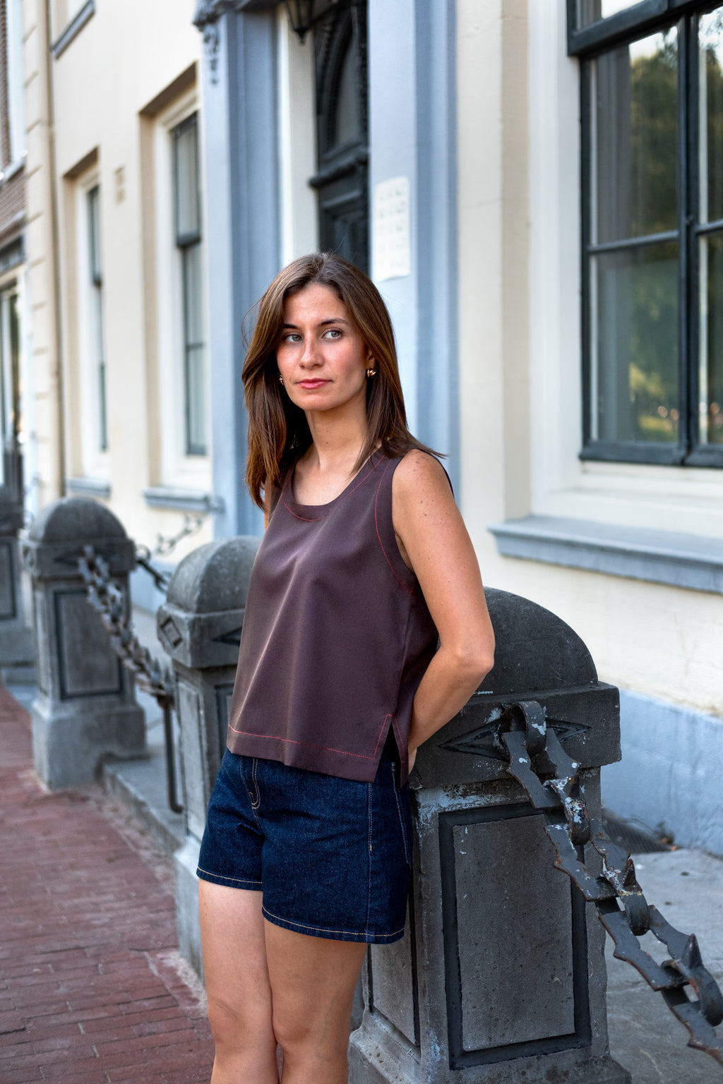 Brown top with red stitching